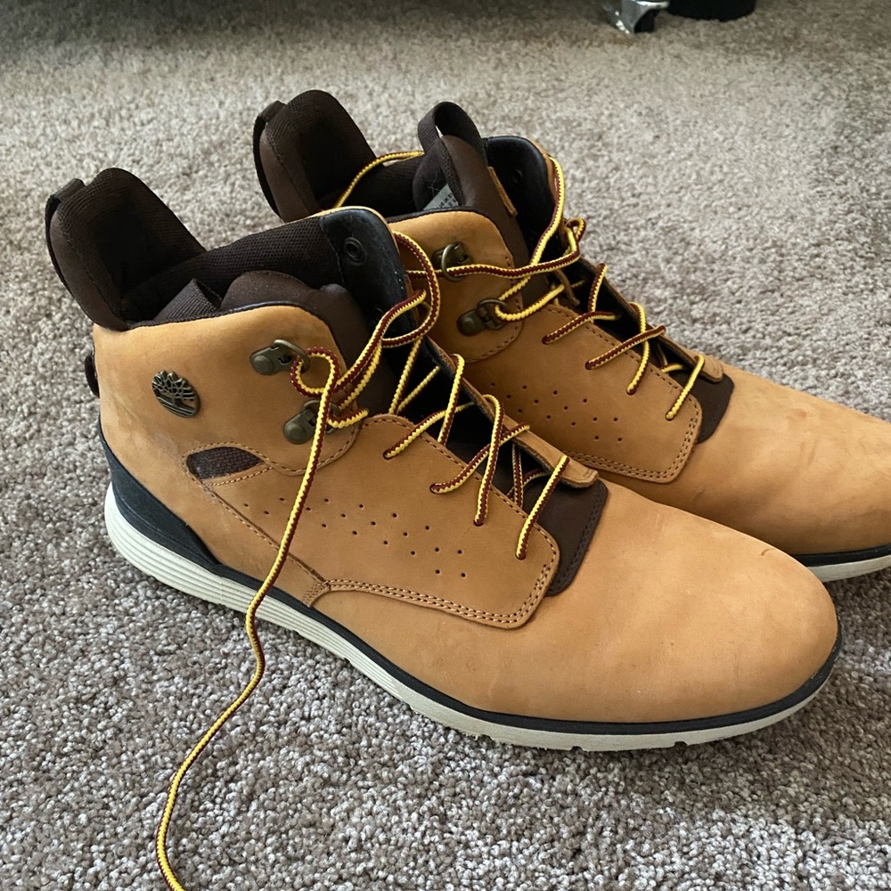 Timberland high rise boot. Has a touch of professional, dressy yet rugged